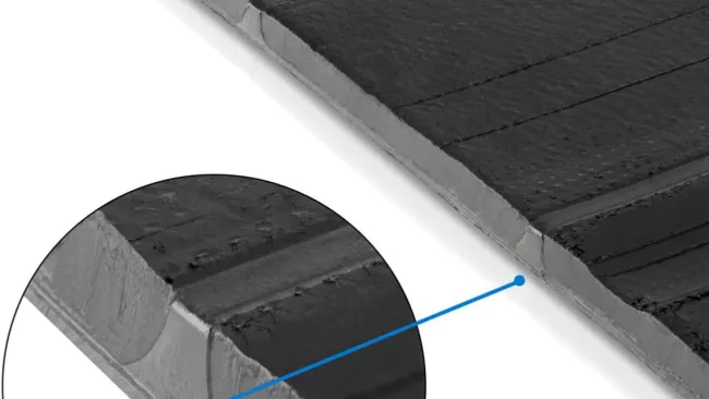 Schematické zobrazení komínového pásu na běhounu pneumatiky