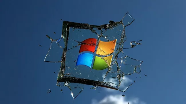 Logo Windows za rozbitým sklem