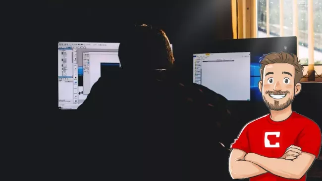 Temný uživatel pracuje se dvěma monitory