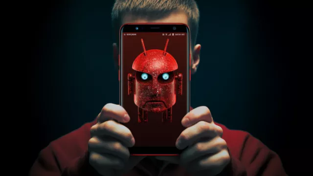 Zle vyhlížející symbol Androidu na displeji smartphonu